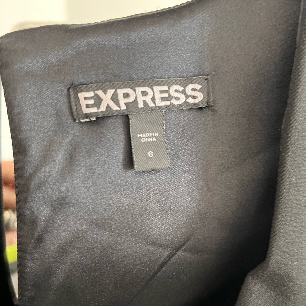 Beautiful black business or after hours dress, never worn.